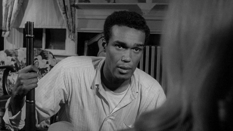 Ben avec un fusil de chasse