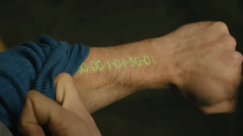 Un bras illuminé de temps restant pour vivre 