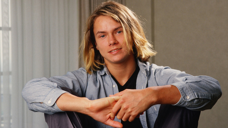 River Phoenix dans une séance photo