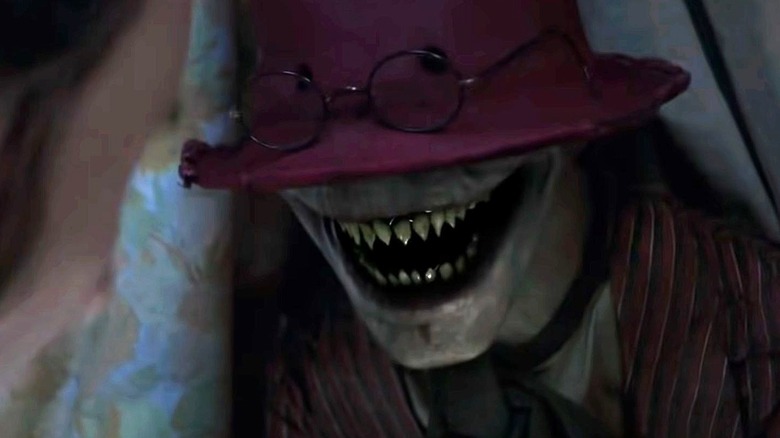 L'homme tordu souriant dans la conjuration 2