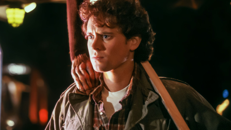 Une main attrape Alex sur l'épaule dans le dernier Starfighter