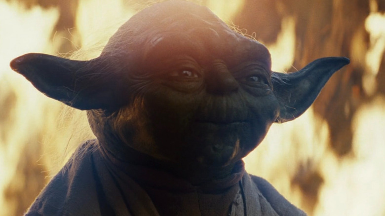 Le fantôme de Force Yoda apparaît devant le feu dans 