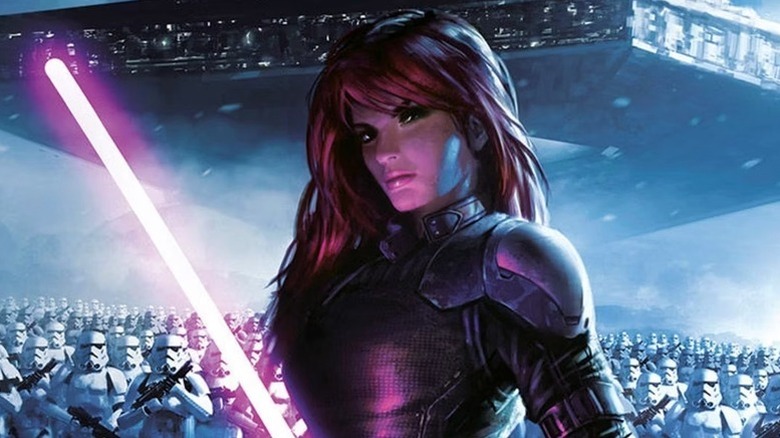 Mara Jade tient un sabre laser violet tout en portant une armure noire devant une légion de stormtroopers