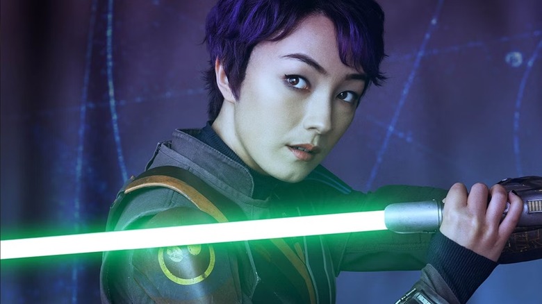 Sabine Wren tenant un sabre laser sur une affiche pour