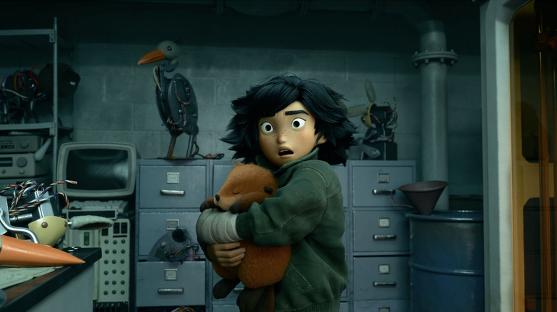 Mabel tient le Hopper de manière protectrice