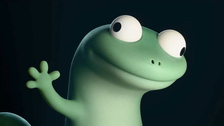 Tom Lizard levant la main dans Hoppers (2026)