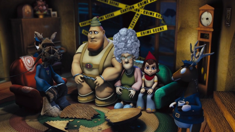 Wolf, Kirk le Bûcheron, Granny et Red menottés dans Hoodwinked !