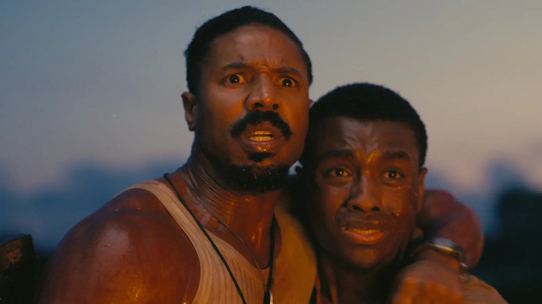 De la fumée étreignant Sammy dans le lac dans Sinners