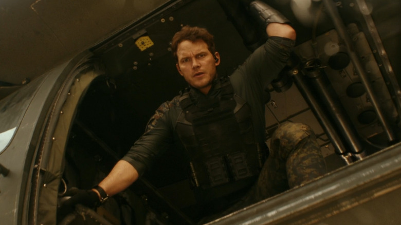 Dan regarde depuis un hélicoptère 