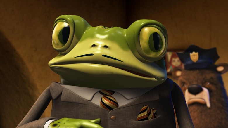 Nicky Flippers grimace tandis que le chef Grizzly se tient en arrière-plan dans Hoodwinked !