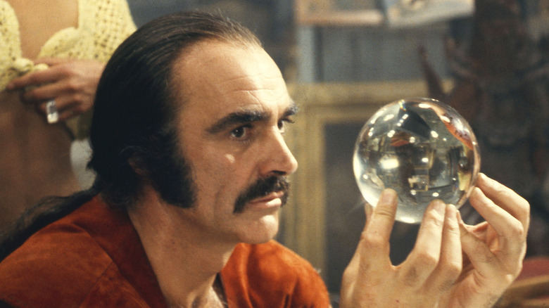 Zed tient une boule de cristal