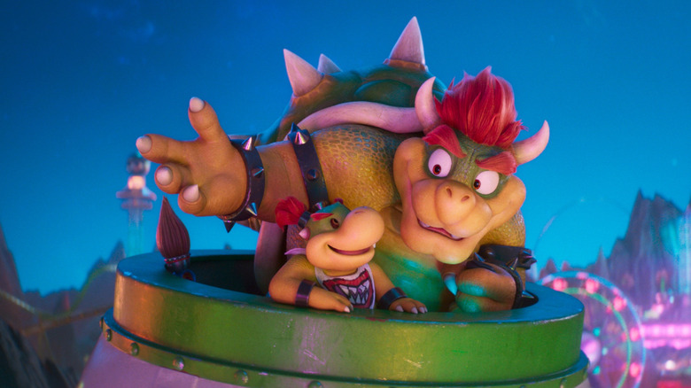 Bowser et Bowser Jr. sourient ensemble 