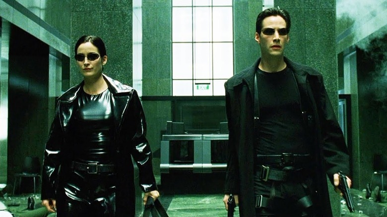 Neo et Trinity se préparent à un combat dans 