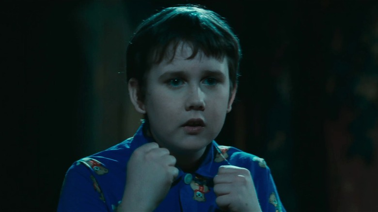 Neville Londubat levant les mains pour se battre dans Harry Potter à l'école des sorciers