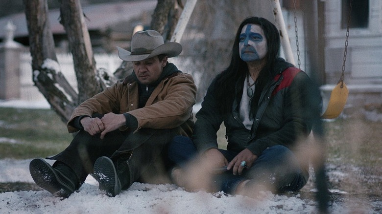 Cory et Martin assis par terre