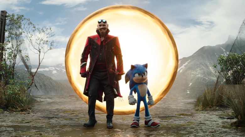 Le Dr Robotnik et Sonic sortent d'un portail en anneau dans