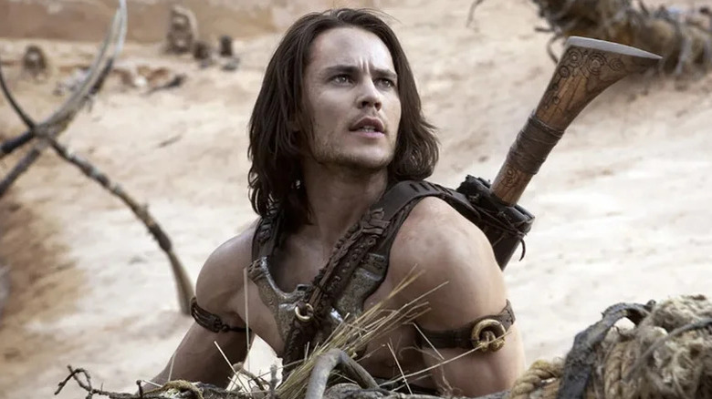 John Carter aux cheveux longs dans un paysage désertique dans John Carter