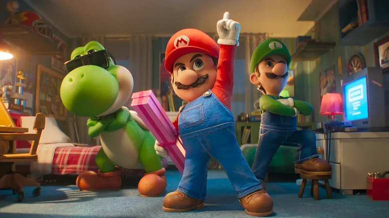 Yoshi, Mario et Luigi prennent une pose héroïque dans The Super Mario Bros Galaxy