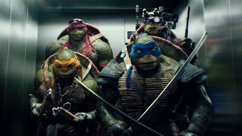 Rafael, Donatello, Leonardo et Michelangelo debout dans un ascenseur à 