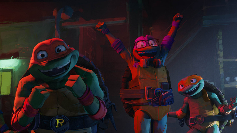Trois des Tortues Ninja en fête dans Teenage Mutant Ninja Turtles : Mutant Mayhem (2023)