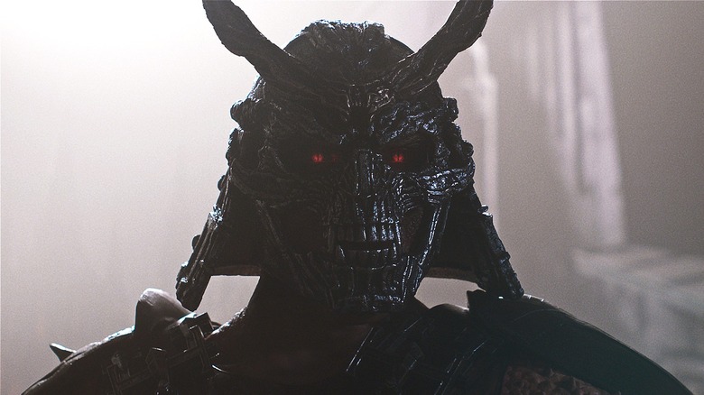 Shao Kahn sourit méchamment dans Mortal Kombat II