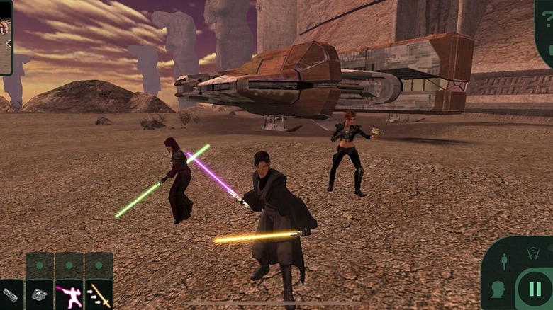 Jedi et membres du groupe se réunissant sur un paysage extraterrestre pendant le jeu de Star Wars : Knights of the Old Republic (2003)