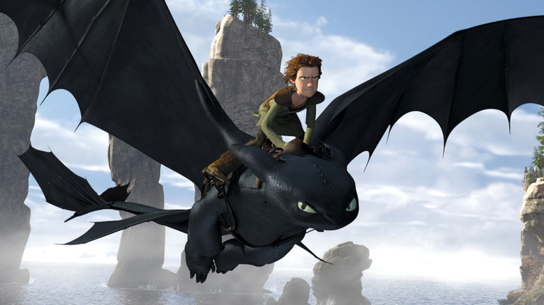 Hiccup chevauchant Krokmou dans les cieux dans Comment dresser votre dragon (2010)