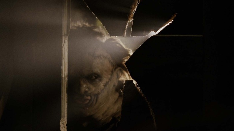 Leatherface passant la tête dedans 