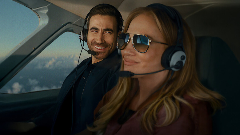 Jackie et Daniel sourient dans un avion