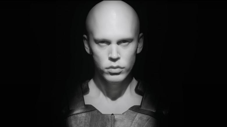 Feyd-Rautha regarde fixement, le visage impassible