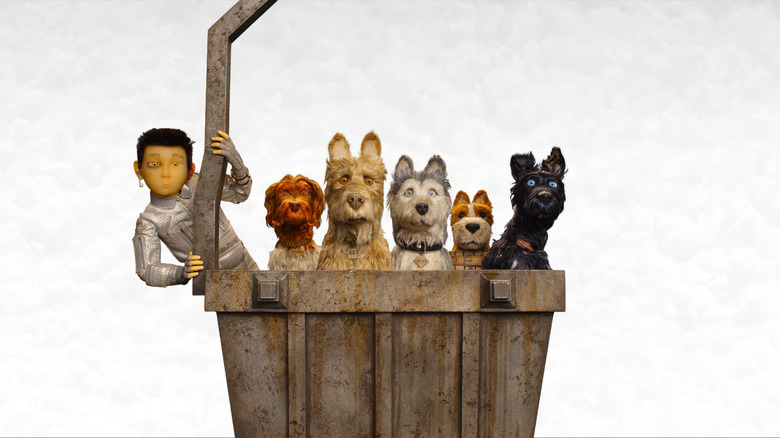 Chief, Rex, King, Duke et Boss grondant sur l'Île aux Chiens