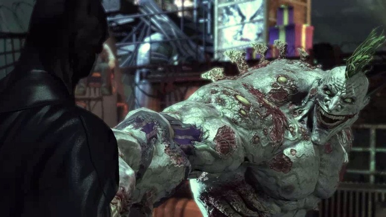 Batman regarde Titan Joker dans Batman : Arkham Asylum