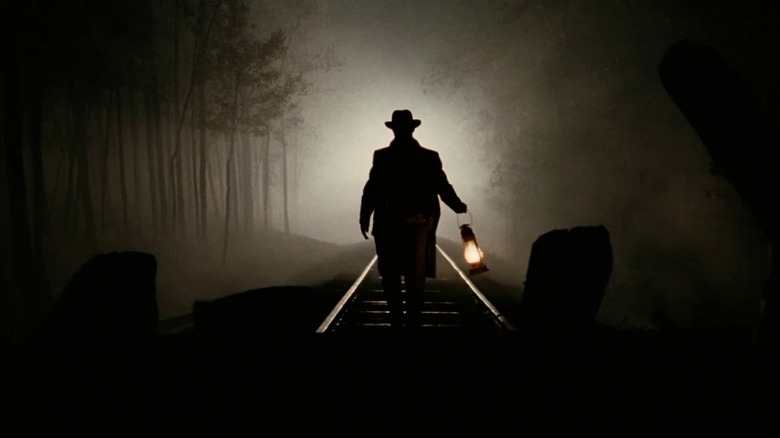 Jesse James se prépare pour le grand braquage de train dans The Assassination of Jesse James (2007)