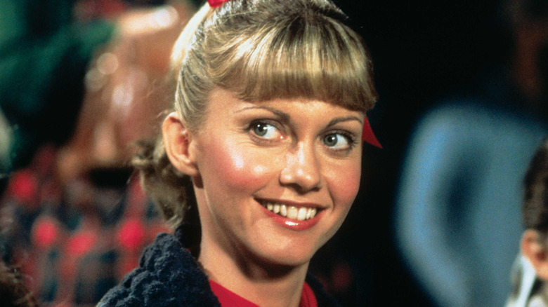 Sandy souriant