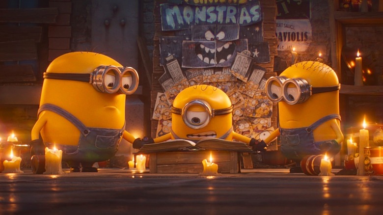 Les Minions tentent de jeter un sort devant l'affiche de leur film (2026)