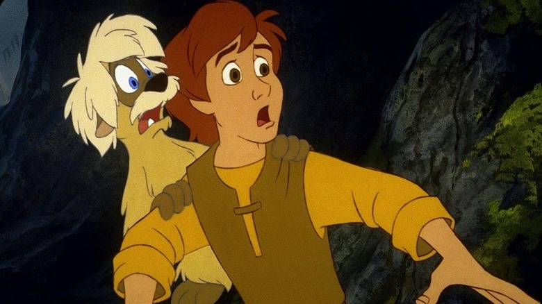 Gurgi accroché au dos de Taran dans The Black Cauldron (1985)