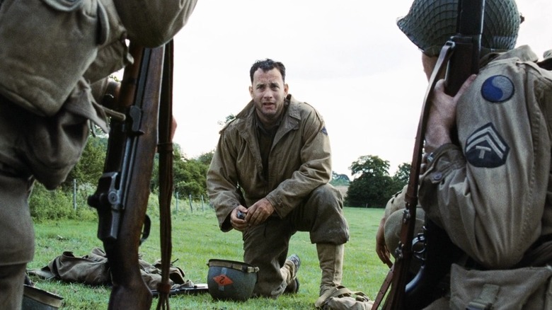 John H. Miller agenouillé au sol dans Il faut sauver le soldat Ryan