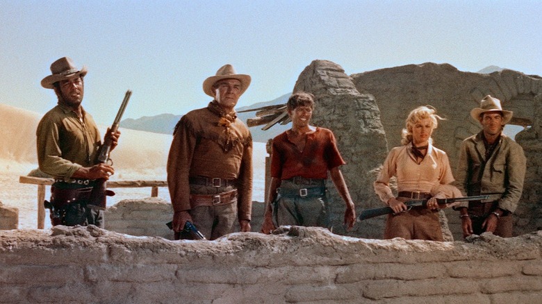 Les protagonistes de Ride Lonesome regardent au loin
