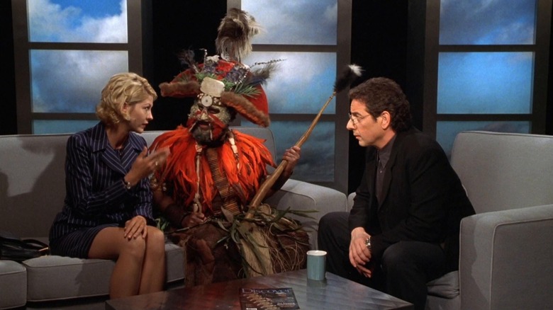 Le Dr Krippendorf passe à la télévision déguisé dans Krippendorf's Tribe (1998)