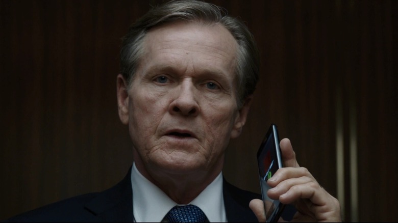 Le président Ellis est témoin d'une prise d'otages dans Iron Man 3 (2013)