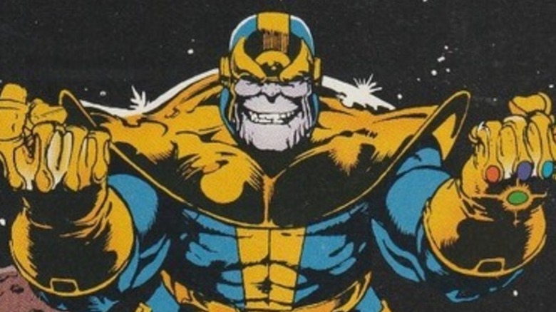 Thanos sourit méchamment et adopte une position de combat. 