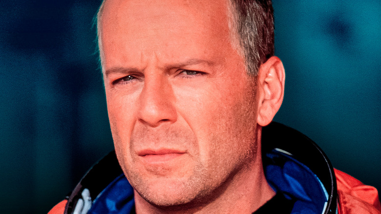 Harry S. Stamper dans Armageddon sur fond bleu