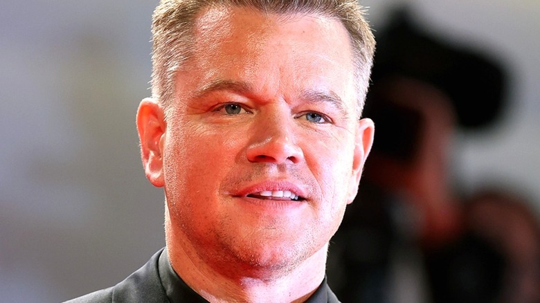 Matt Damon visage sourire narquois