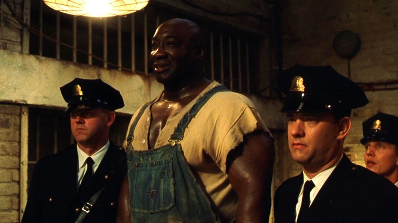 John Coffey se dirige vers la chaise électrique 
