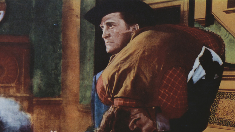 Morgan portant un homme dans Last Train from Gun Hill