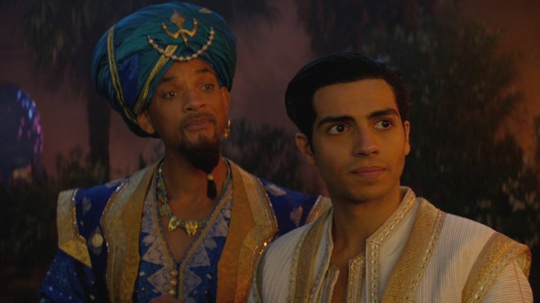 Le Génie et Aladdin discutent avec Jafar dans Aladdin
