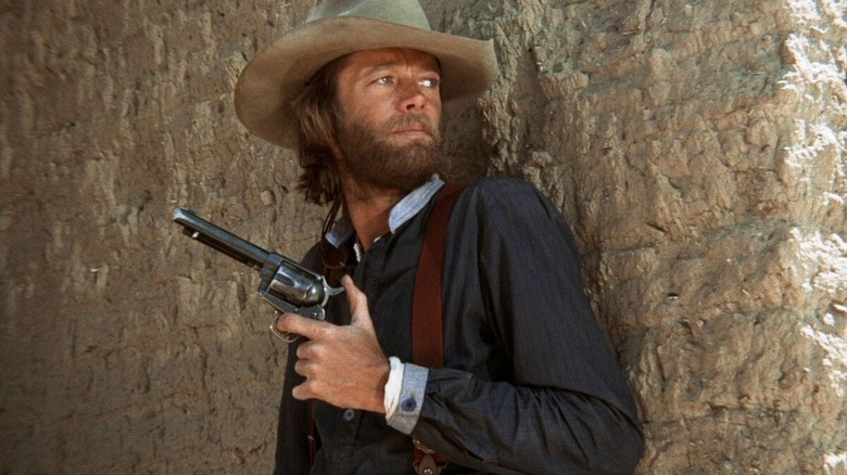Harry Collings prépare son arme 