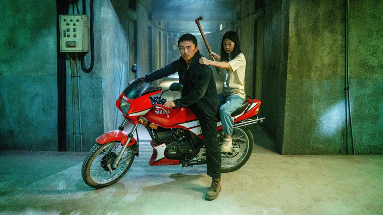 Wang Wei sauvant Rainy dans The Furious (2026)