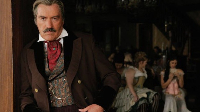 Powers Boothe Cy Tolliver penche les prostituées