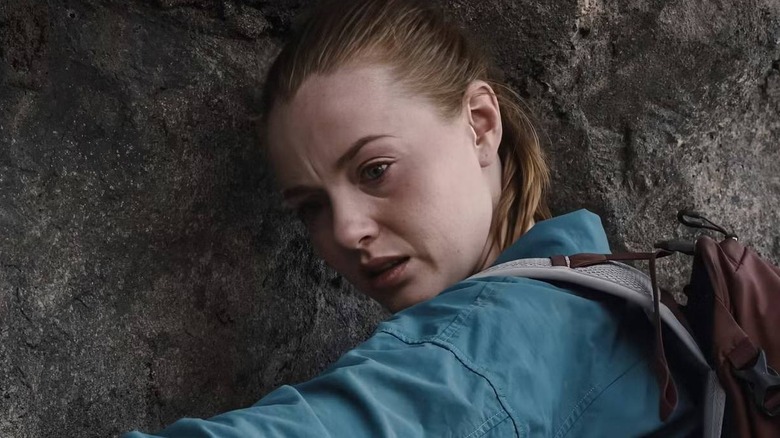 Jax regardant depuis une montagne dans Fall 2 : Deadpoint